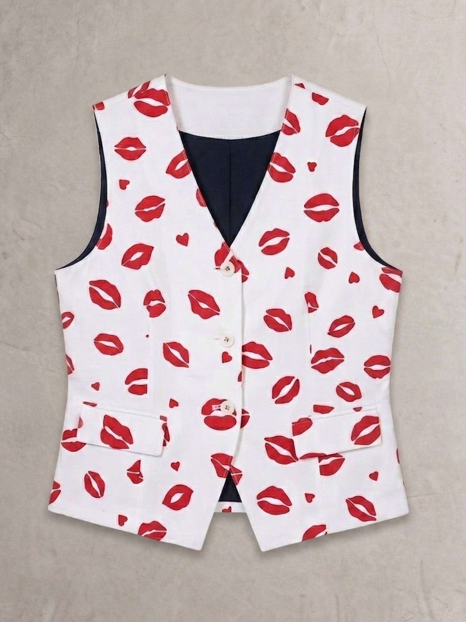 リップ柄ベスト